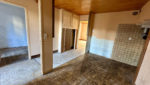 Appartement de type 2 avec terrasse, dépendance et terrain