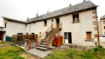 Ensemble immobilier, proche centre ville ESPALION, en pierres, garages, terrain.