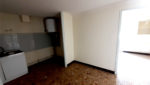 Ensemble immobilier, proche centre ville ESPALION, en pierres, garages, terrain.