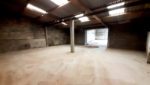 Ensemble immobilier, proche centre ville ESPALION, en pierres, garages, terrain.