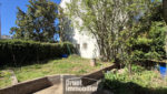ESPALION, maison de ville, 4 chambres, terrain, garage.
