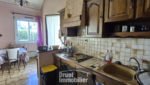 ESPALION, maison de ville, 4 chambres, terrain, garage.