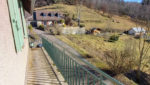 ESTAING, Immeuble de rapport de 2 logements, loués avec terrain et garage.