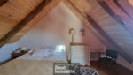 Maison en pierres avec piscine - sur terrain arboré.