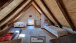 Maison en pierres avec piscine - sur terrain arboré.