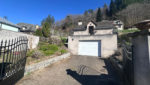 Maisonnette avec garage et jardin