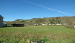 SAINT COME D'OLT, terrain plat de 1500m2 proche centre ville