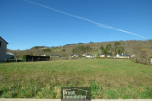 SAINT COME D'OLT, terrain plat de 1500m2 proche centre ville