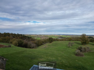 Ensemble Immobilier composé d'un corps de ferme et de 26 hectares de terrain