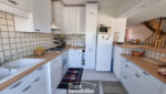 ST GENIEZ D OLT AUBRAC - APPARTEMENT - GARAGE - PARKING PRIVATIF
