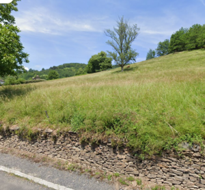 ESTAING, terrain de plus de 2ha, en partie constructible.