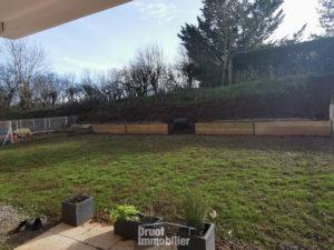 Appartement T3 avec jardin, garage et 1 place de parking
