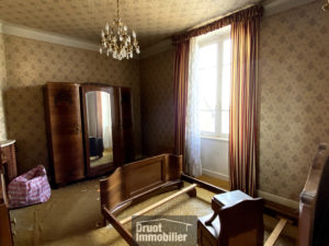 Immeuble composé de 3 appartements, un garage et terrain attenant